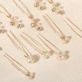 KALOLIA pins inserted in a bridal bun demonstrating secure decorative hold