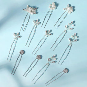 KALOLIA pin held in hand showing true scale and easy placement