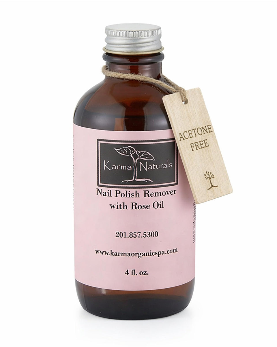 Karma Organic front bottle showing rose oil and gentle remover benefits