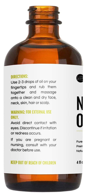 Kate Blanc neem oil on bathroom shelf in minimalist setting for daily routine