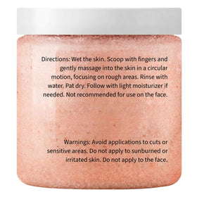 Hand applying KateS scrub to damp skin, demonstrating application and immediate smoothing benefit