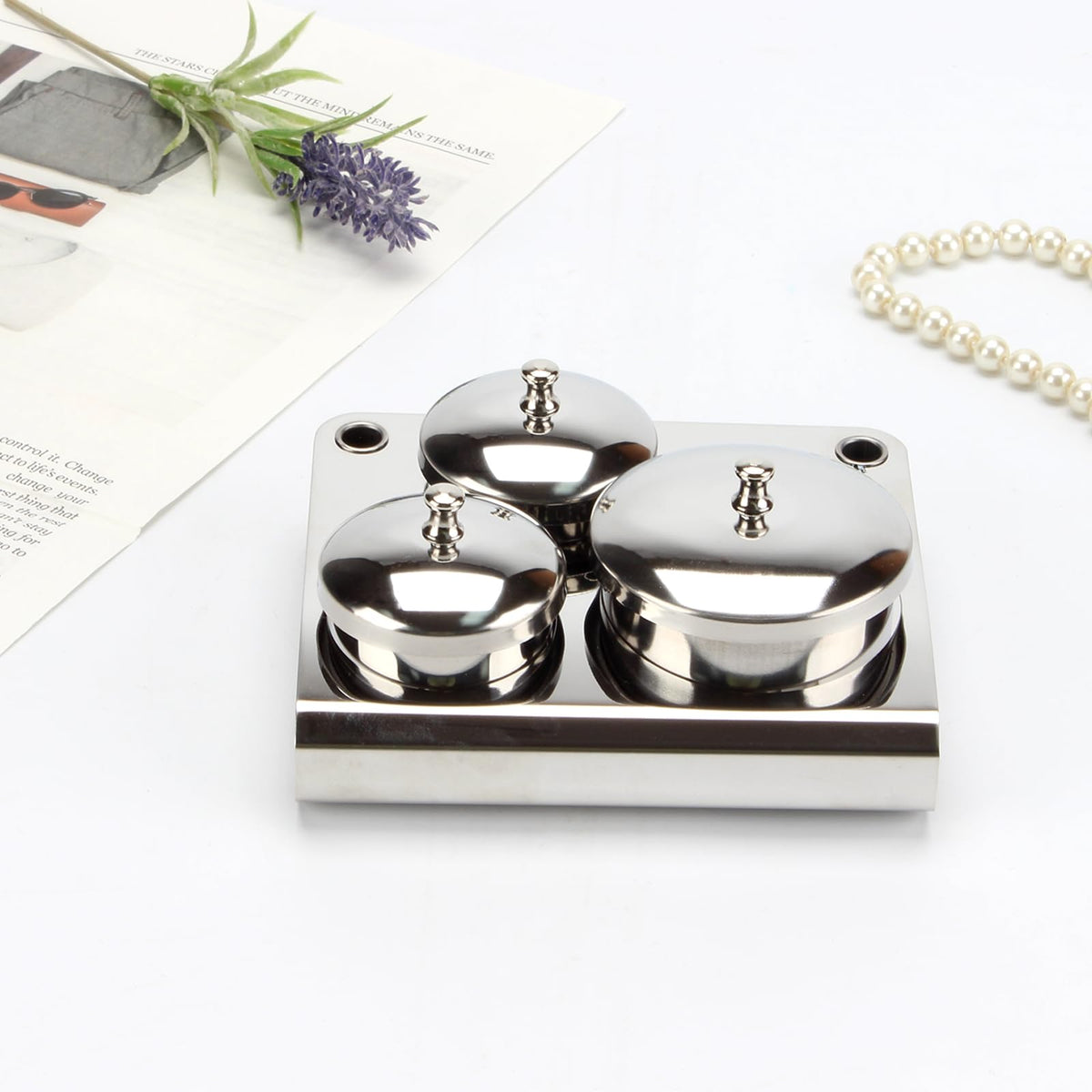 KCGANI size comparison with coin showing compact travel-friendly scale