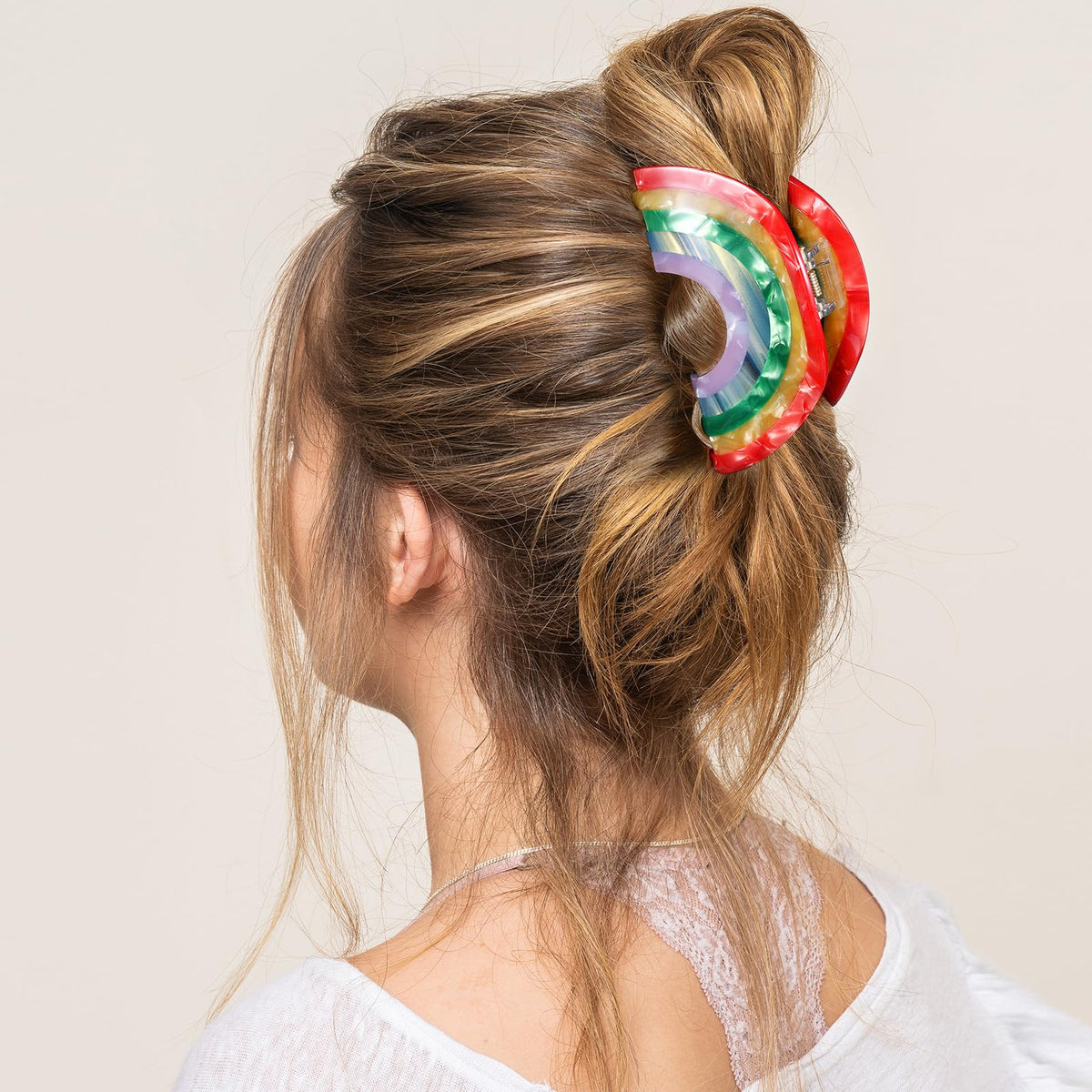 KCHIES full-up bun on thick hair showing firm hold without tugging