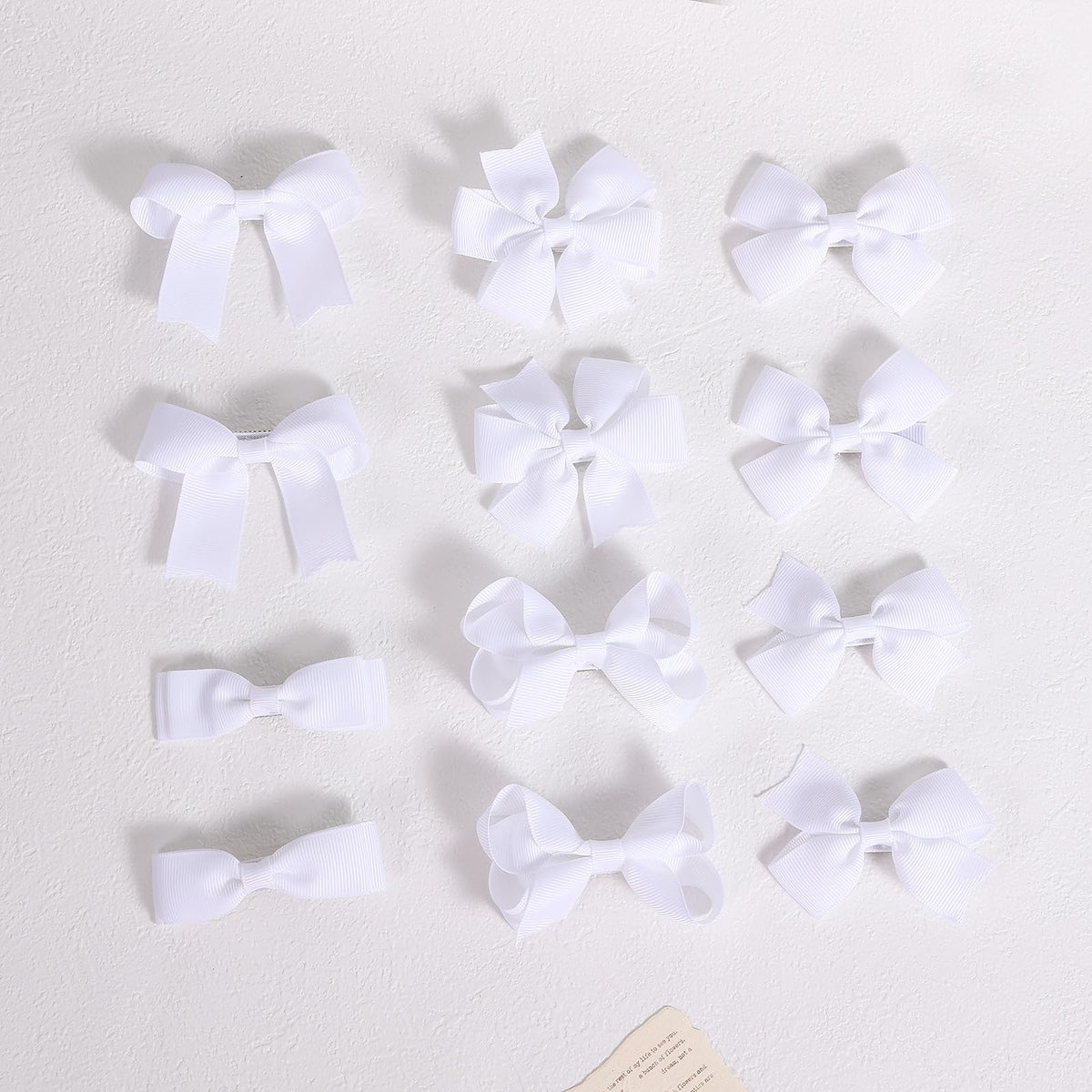 KCHIES bows in toddler pigtails show comfortable, non-slip styling