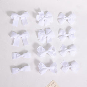 KCHIES bows in toddler pigtails show comfortable, non-slip styling