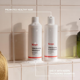 Keeps conditioner poured on palm illustrating smooth application and spreadability
