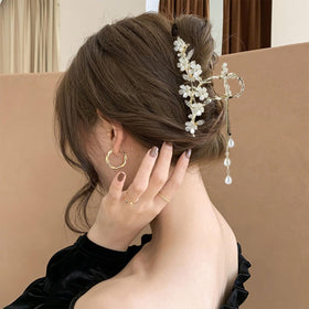 Kemmintvn side profile showing curved clip shape for comfortable secure fit on head