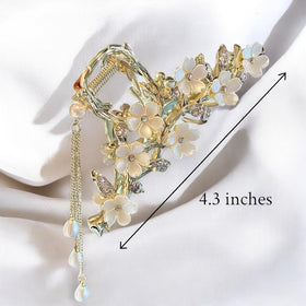 Kemmintvn clip next to a ruler showing 4.5 inch length for scale and sizing clarity