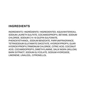 Kenra Clarify shampoo placed in bathroom lifestyle setting showing bright hair result