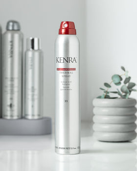 Kenra-sprayed curled hair showing glossy finish and enhanced color vibrancy