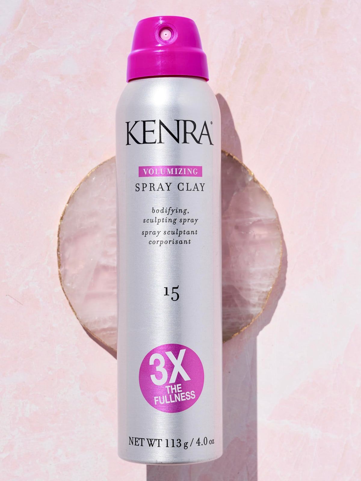 Kenra spray action in studio demonstrating fast-dry volumizing effect
