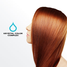 KERACOLOR being sprayed on wet hair to detangle and neutralize minerals