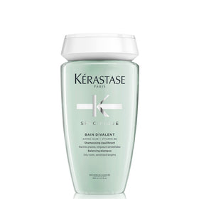 KÉRASTASE front bottle view showing product and benefit for balanced scalp
