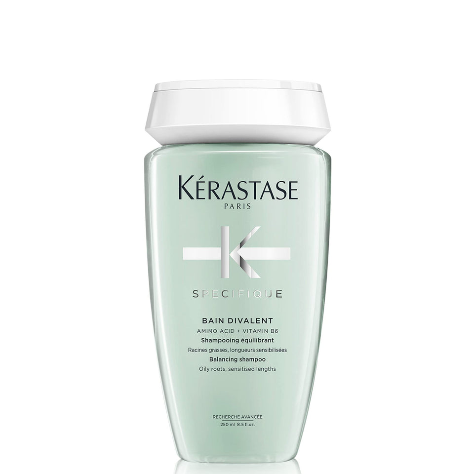 KÉRASTASE front bottle view showing product and benefit for balanced scalp