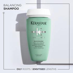 KÉRASTASE close-up of cap and pump highlighting easy dispensing benefit