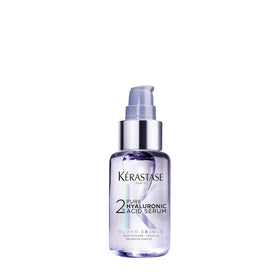 KÉRASTASE front bottle showing product and benefits