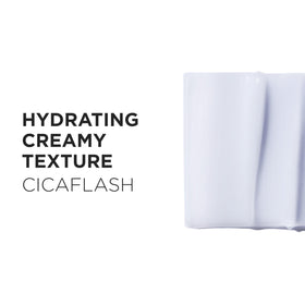 KÉRASTASE bottle in hand to illustrate size and travel-friendly convenience