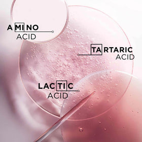 KÉRASTASE pouch pouring into a shampoo bottle highlighting sustainable refill benefit