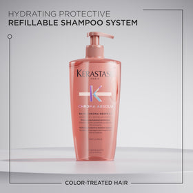 KÉRASTASE close-up of shampoo lather demonstrating rich, hydrating foam
