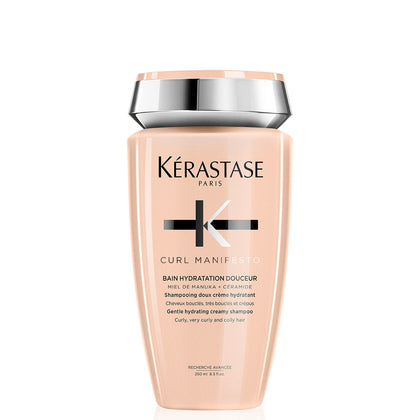 KÉRASTASE front bottle view showing product and branding, highlights premium packaging and clarity