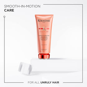KÉRASTASE creamy conditioner texture close-up showing smoothness benefit