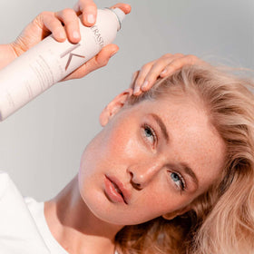 KÉRASTASE styled second-day hair, displays added volume and refreshed look