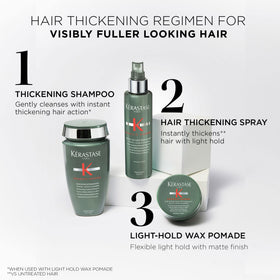 KÉRASTASE bottle in hand to show 8.5 fl oz size and easy grip