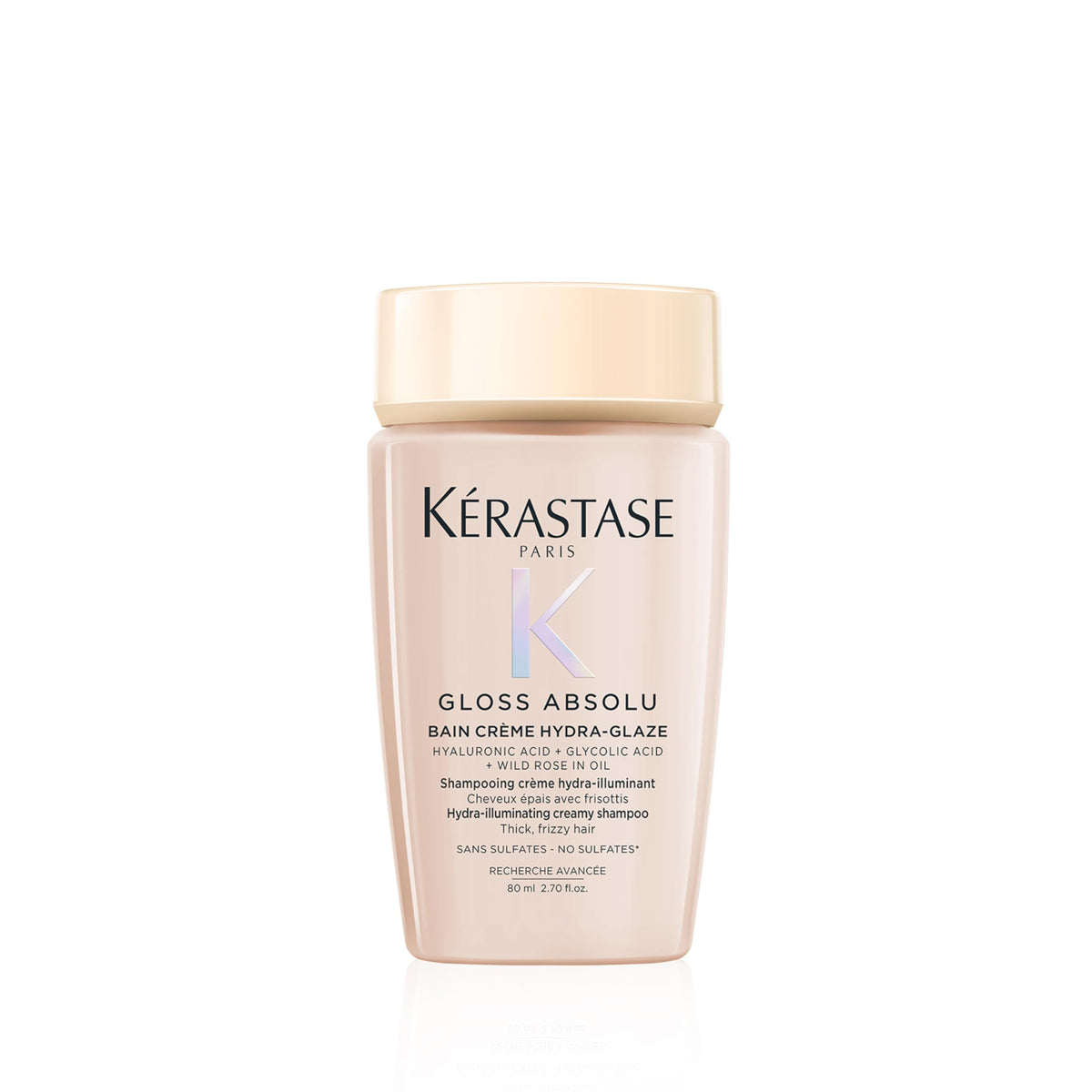 KÉRASTASE bottle on bathroom shelf in lifestyle setting highlighting salon-quality routine benefit