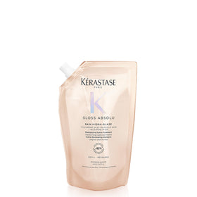 KÉRASTASE front bottle showing label and glossy finish benefit