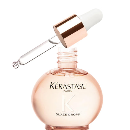 KÉRASTASE front packaging showing glossy anti‑frizz oil benefit