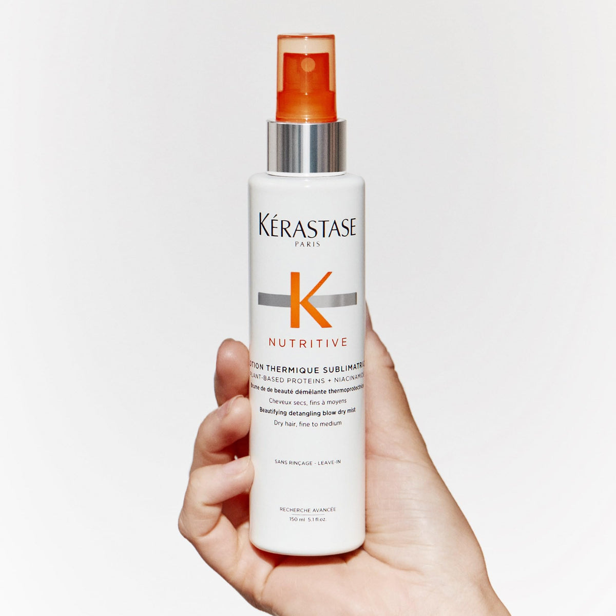 KÉRASTASE ingredients label with niacinamide and plant proteins for nourishment benefit