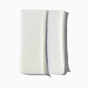 KÉRASTASE mask in a bathroom setting suggests salon-level results at home