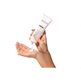 KÉRASTASE Nectar Thermique used during blow‑dry styling for heat protection