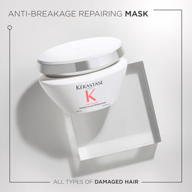KÉRASTASE product label close-up showing key ingredients and benefits
