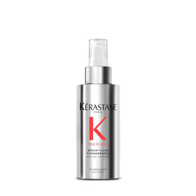 KÉRASTASE front bottle view showing sleek packaging and professional benefit