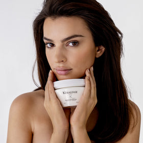 KÉRASTASE in bathroom routine scene, integrated into everyday care benefit