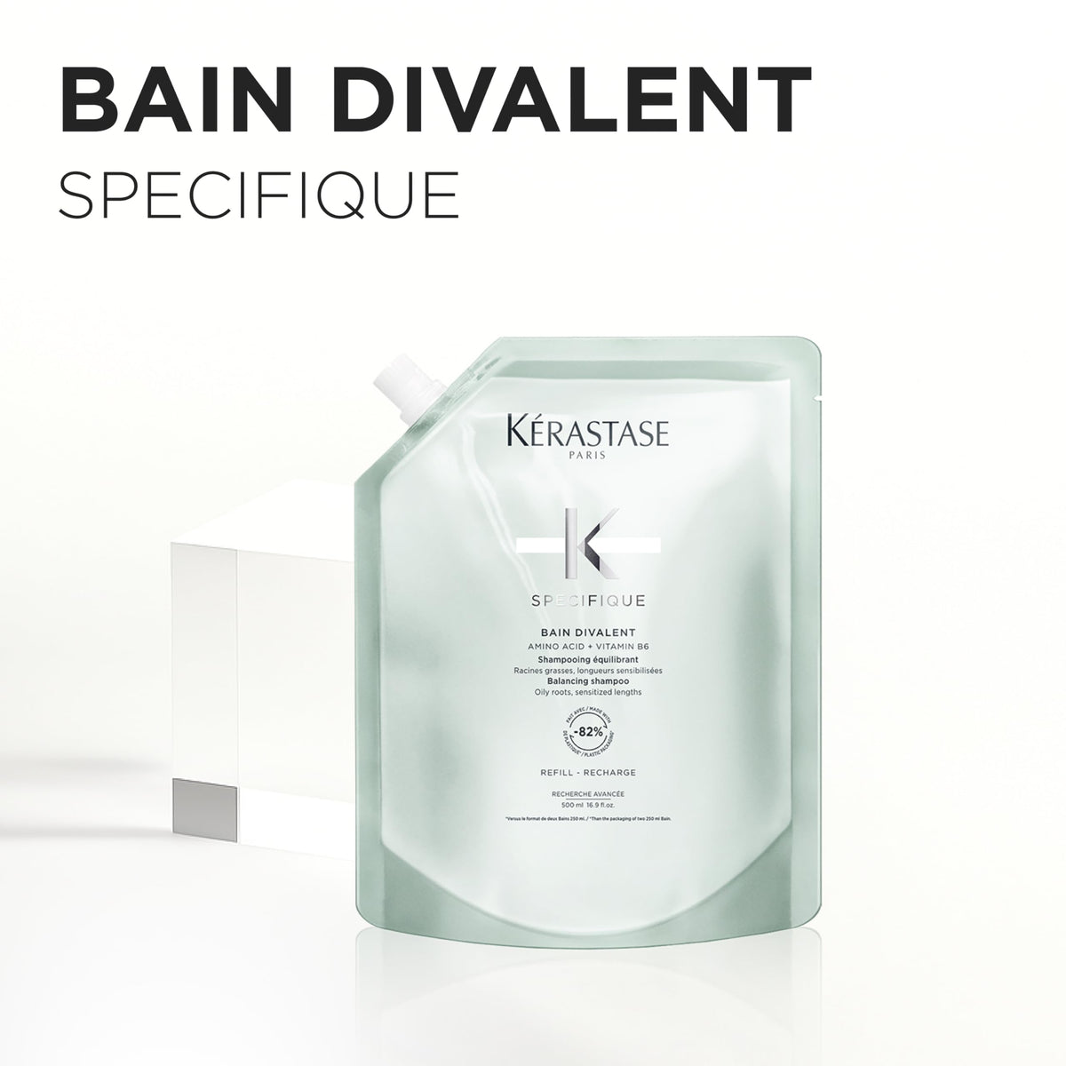 KÉRASTASE shampoo being massaged on scalp to lift oil and buildup