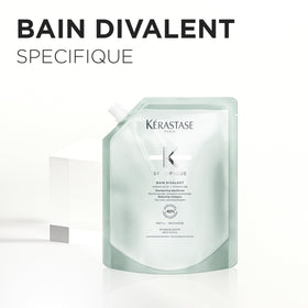 KÉRASTASE shampoo being massaged on scalp to lift oil and buildup