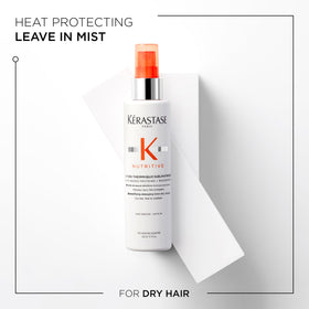 KÉRASTASE being sprayed on towel-dried hair demonstrating detangling and protection benefit