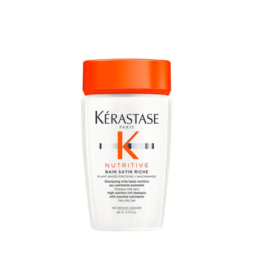 KÉRASTASE travel bottle front showing compact nourishing shampoo