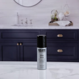 Keratin Complex styled hair lifestyle image showing high shine and controlled frizz after use
