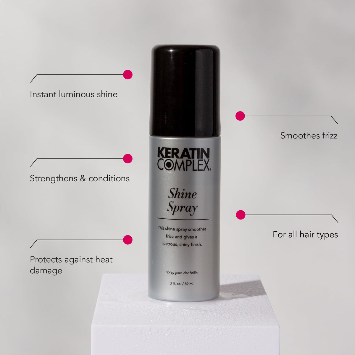 Keratin Complex spray action close-up demonstrating fine mist for even weightless shine