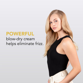 Keratin Complex bottle in hand showing 2.5 fl oz scale and travel-friendly convenience
