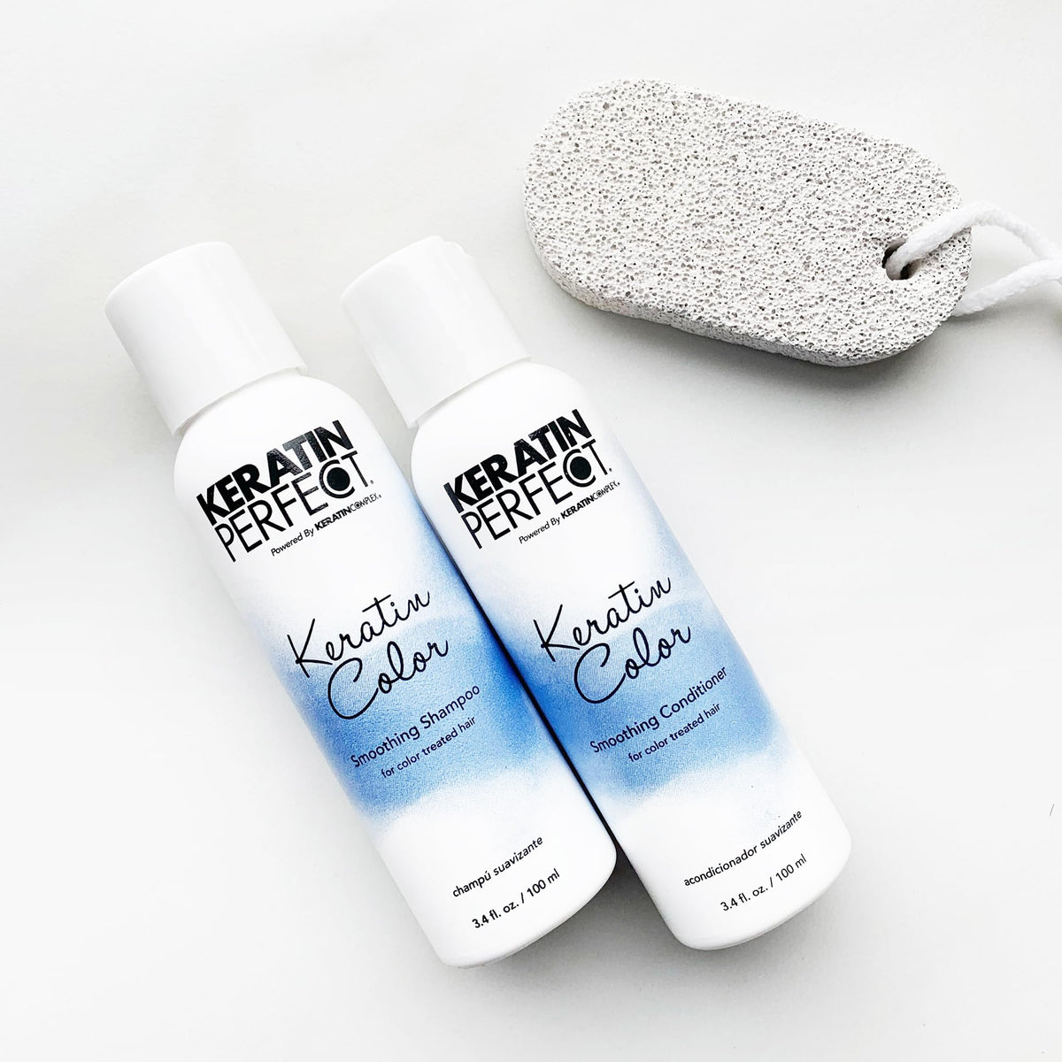 Keratin Perfect duo on bathroom shelf styled for travel-ready hair care