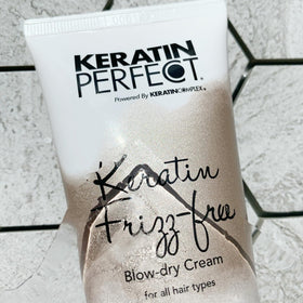 Keratin Perfect inside a travel pouch with brush and clips showing on-the-go salon finish benefit