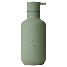 KEUNE dispenser front view showing clean design and refillable benefit