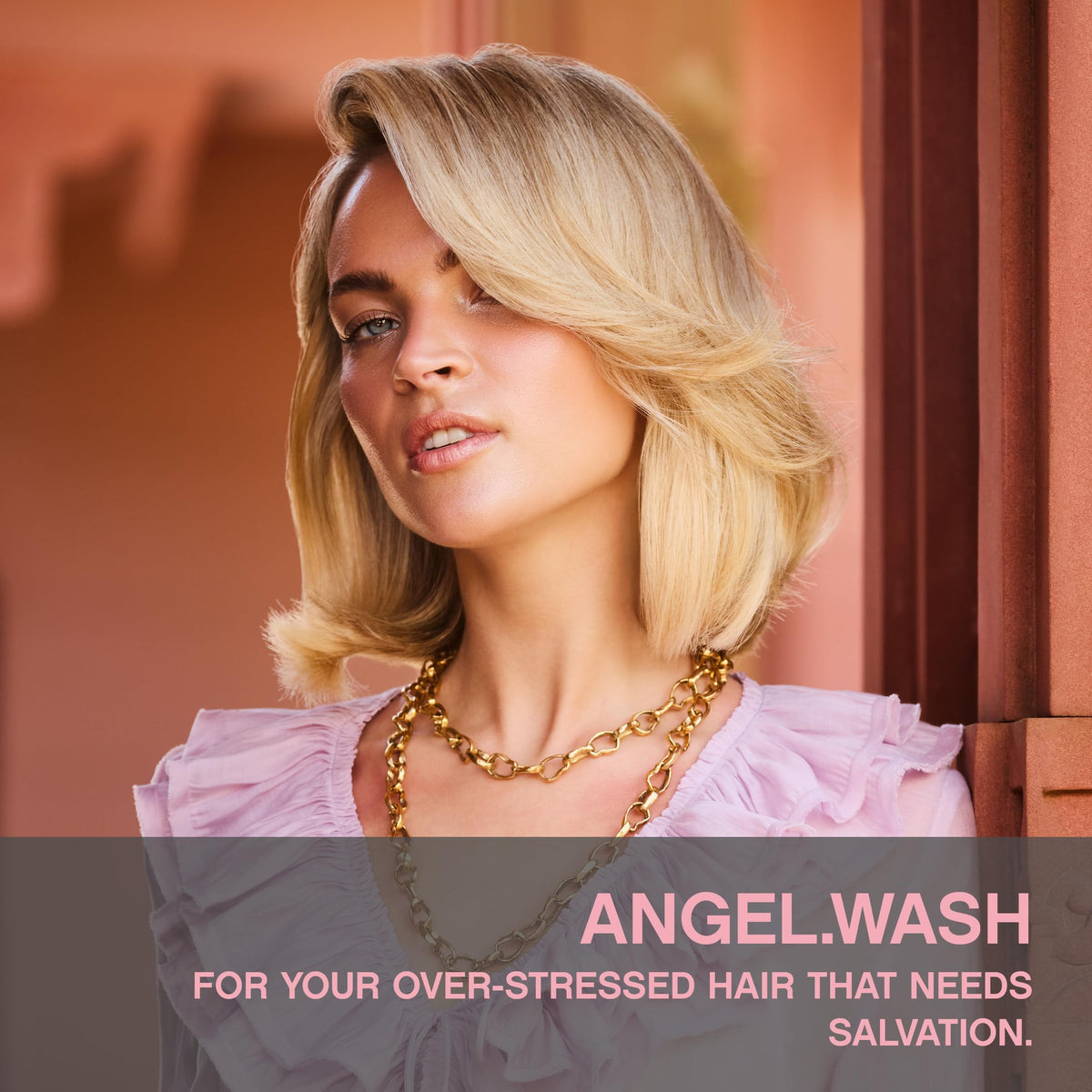 KEVIN.MURPHY ANGEL.WASH pump and cap detail highlighting easy dispensing and travel-friendly design