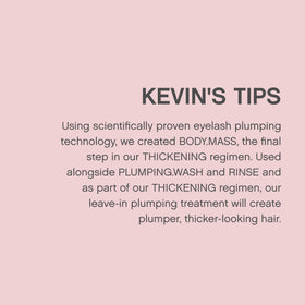 KEVIN.MURPHY Body Mass 3.4 oz held in hand to show product scale and travel-friendly size