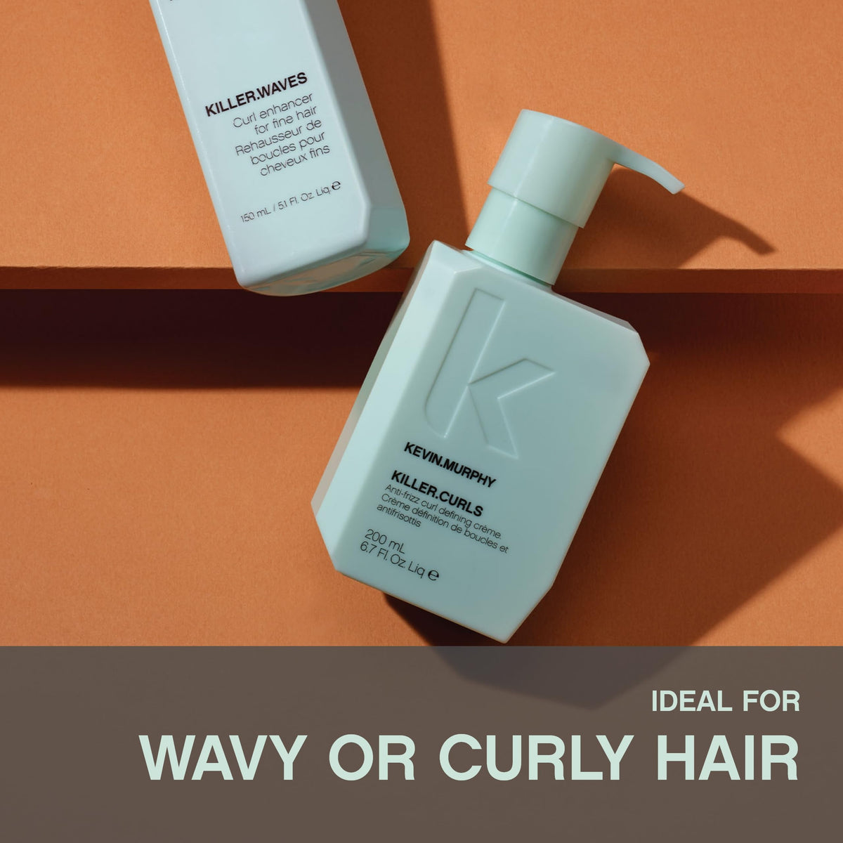 KEVIN.MURPHY applying cream to damp curly hair for frizz control
