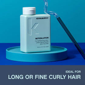 KEVIN.MURPHY MOTION.LOTION being worked into damp hair for defined curls
